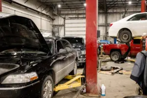 AC repair Red Deer mechanic inspecting vehicle air conditioning system at Gearhead Auto