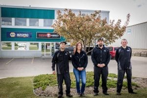 gearhead auto team out front of building in Edgar Industrial Park